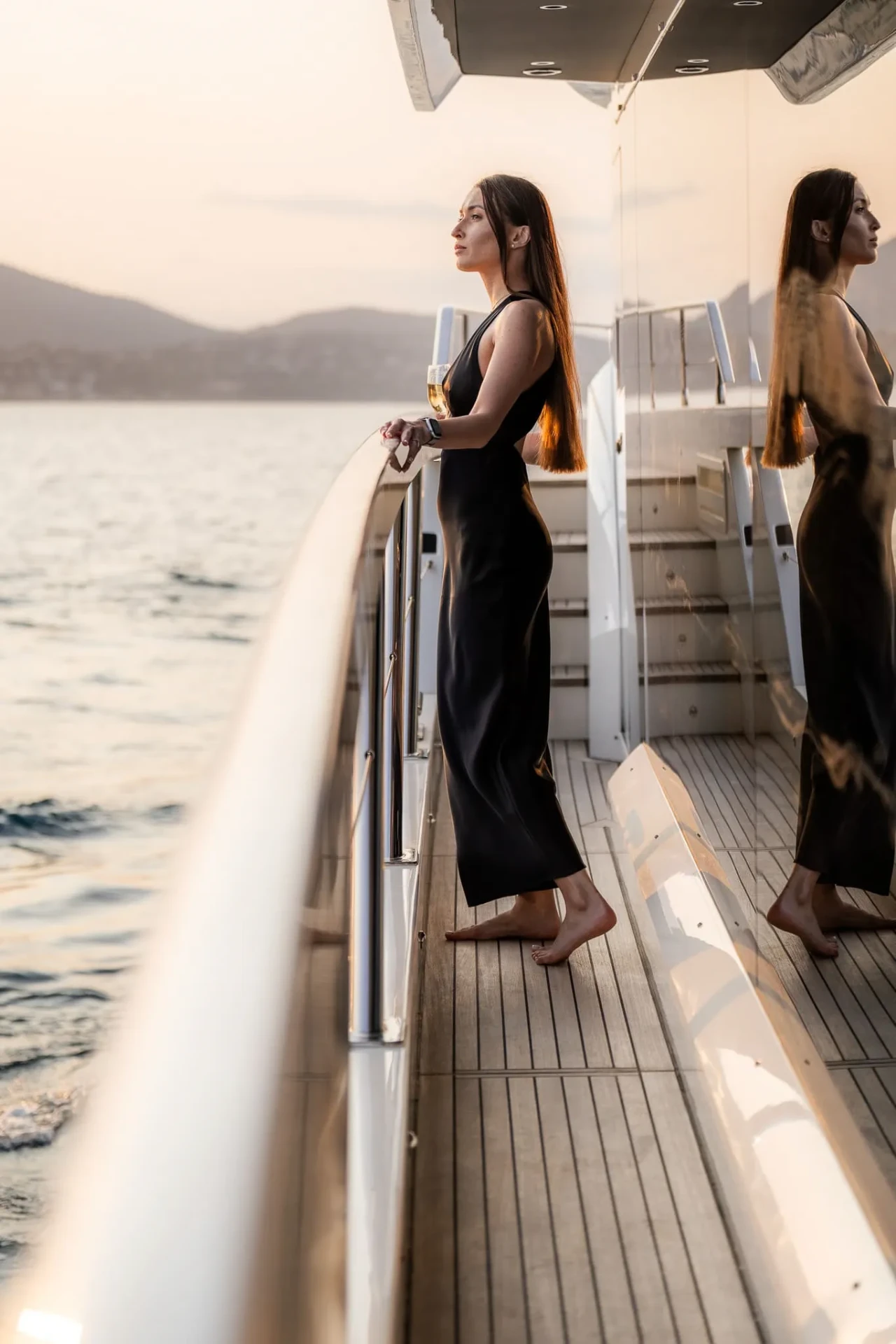 Guest on the aft deck at golden hour