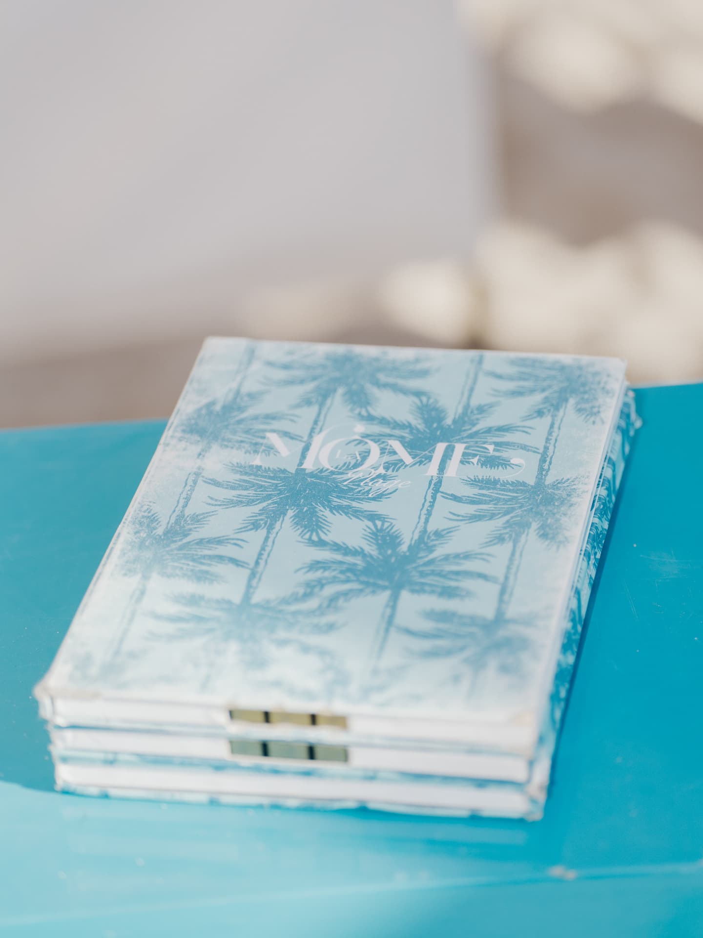 Printed menus on a blue table