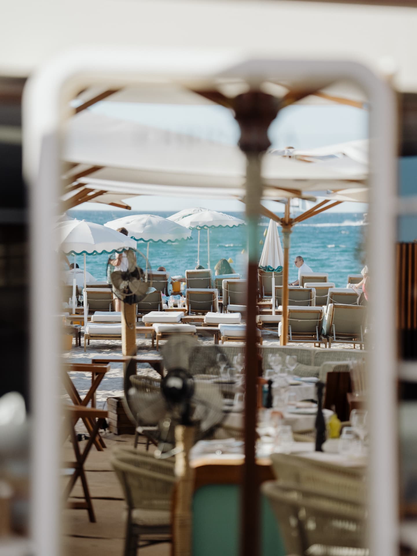 Beach club seen through a doorway