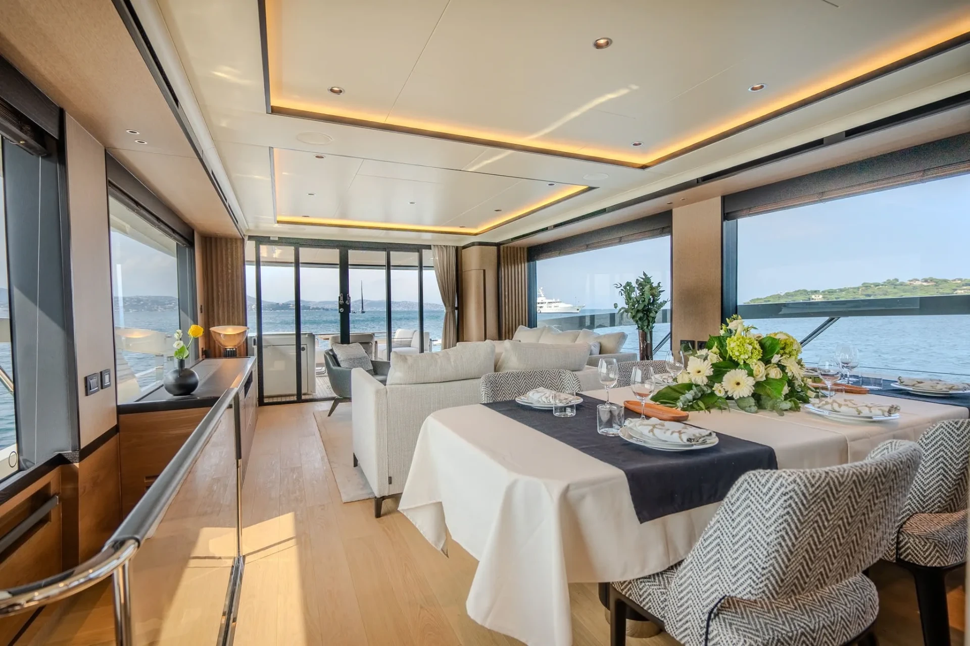 Saloon table set facing the bay