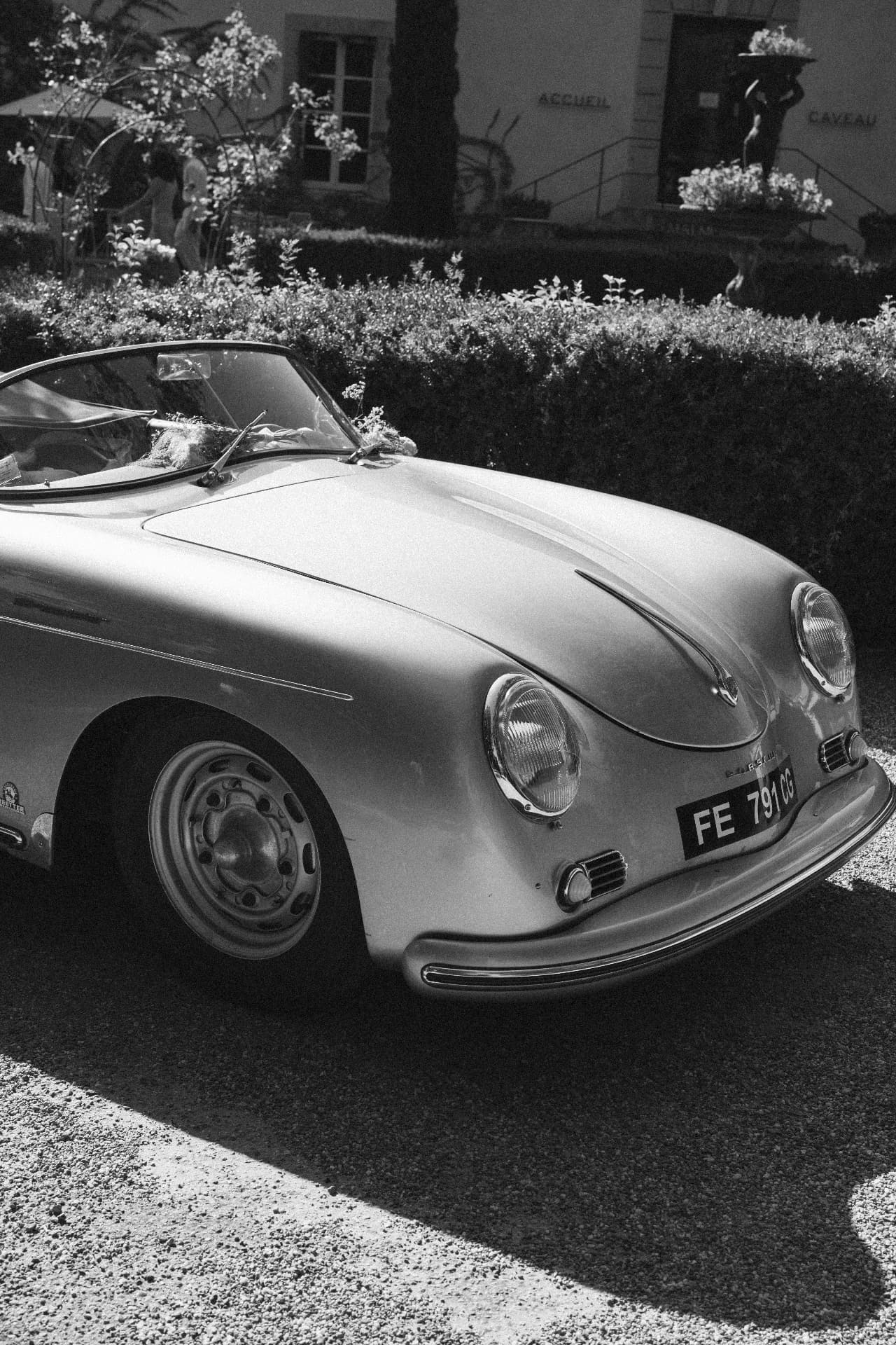 Vintage roadster at the château in black and white