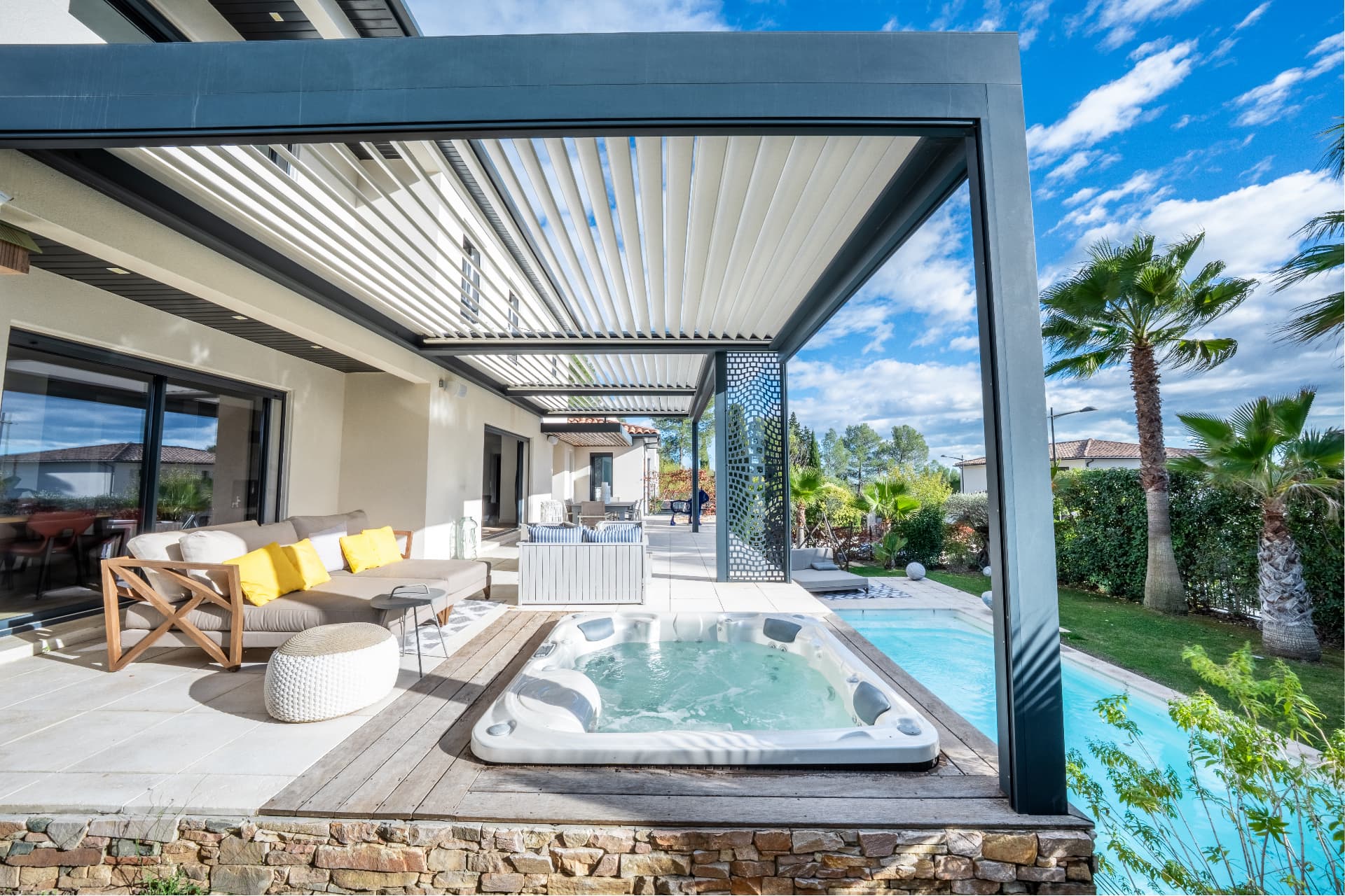 Shaded terrace with spa and pool